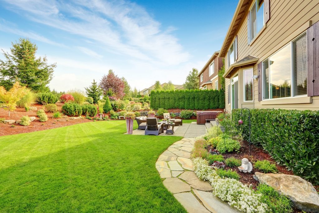 Outdoor landscaping with well-maintained patio.