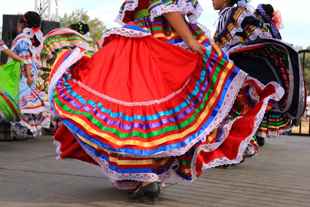 Colorful skirts flying during a dance